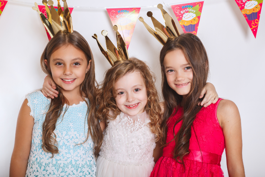 Girls in birthday crowns