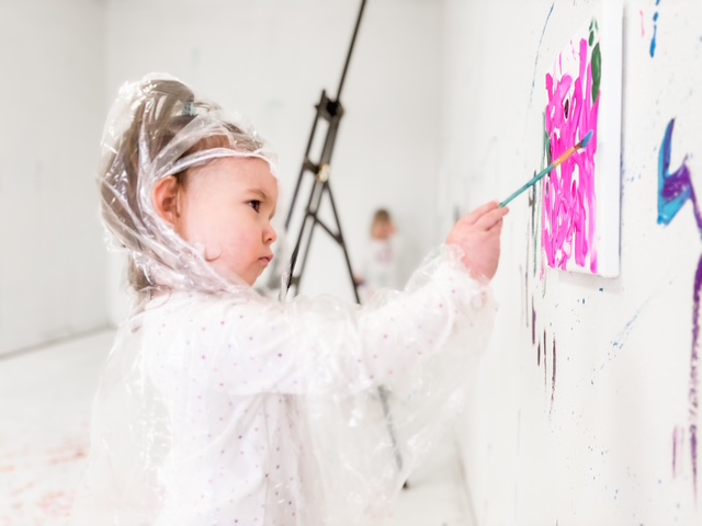 Splatter painting supplies and paint station at Celebrate You Taylorsville NC